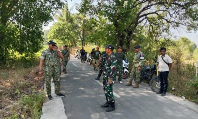 Dandim 1409/Gowa Letkol Inf Gilang Nugraha Kresnadi meninjau kesiapan lahan dan infrastruktur Kompi Produksi di Desa Pannyangkalang, Bajeng, Gowa, jelang peresmian 29 September 2026.