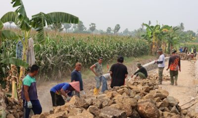 Pembangunan talud TMMD ke-130 Kodim 1409/Gowa di Desa Kalebarembeng mencapai 46 persen. Dansatgas Letkol Arm. Sapari menegaskan pengawasan dan kualitas pekerjaan. Tags: TMMD ke-130, Kodim 1409/Gowa, Letkol Arm Sapari, pembangunan talud, Desa Kalebarembeng, Bontonompo, Kabupaten Gowa, pengawasan pembangunan, TNI Manunggal Membangun Desa, Pendim 1409/Gowa